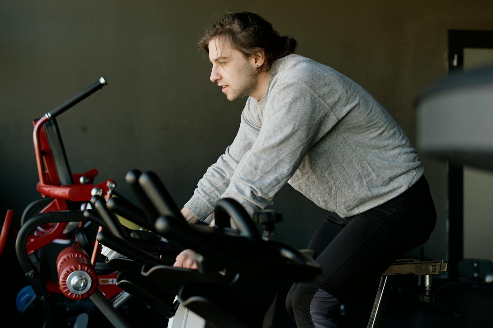 Person training on an indoor stationary bicycle